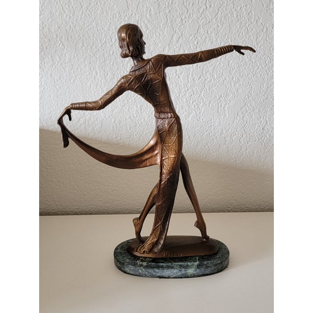 This item is an Art Deco bronze sculpture of a dancing woman, typically attributed to or produced in the style of Austrian...