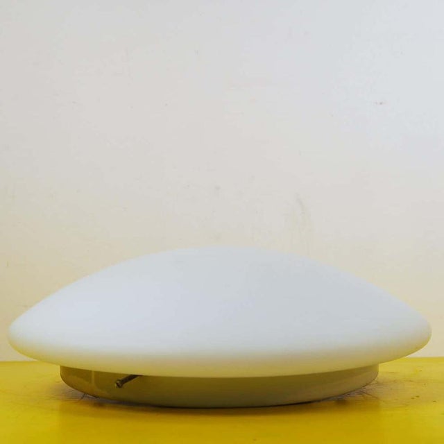 – hole diameter 29.5 cm – has small imperfections visible in the photo Height: 12.5 Diameter: 46 This piece is attributed...