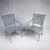 Vintage Brown Jordan Florentine patio set consisting of two cast aluminum armchairs and a matching round table. The...