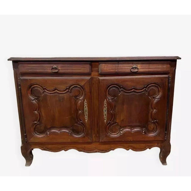 Louis xv style solid oak sideboard, ideal for adding an authentic and warm touch to your home. its refined design is...