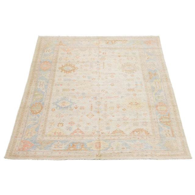 This stunning handmade wool rug captures the essence of classic Turkish design with a refreshed, contemporary palette....
