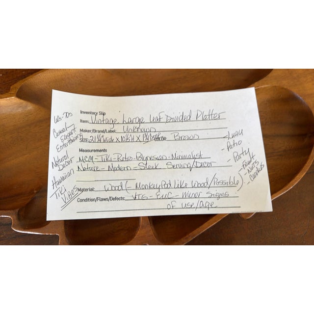 Vintage hand-carved wooden divided platter features a large leaf shape with four distinct compartments, perfect for...