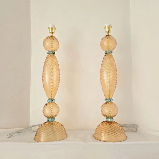 Pair of large mid-century modern Murano lamps, Vistosi style, Italy 1980s. The table or desk lamps have a neoclassical to...