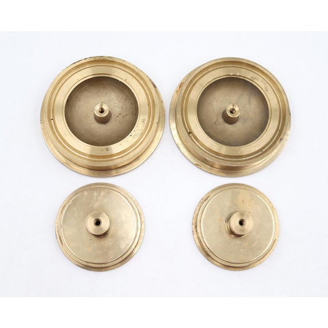Reclaimed concentric circular double door pulls made of brass with a polished brass finish. Stamped made in Italy. The...