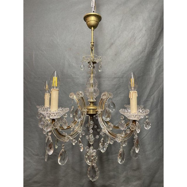 Bring some old-world cool to your space with this standout vintage Marie-Thérèse chandelier. French in style and full of...