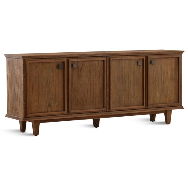Beautifully crafted four-door Mindi wood sideboard with a rich walnut brown finish, clean lines, and generous concealed...