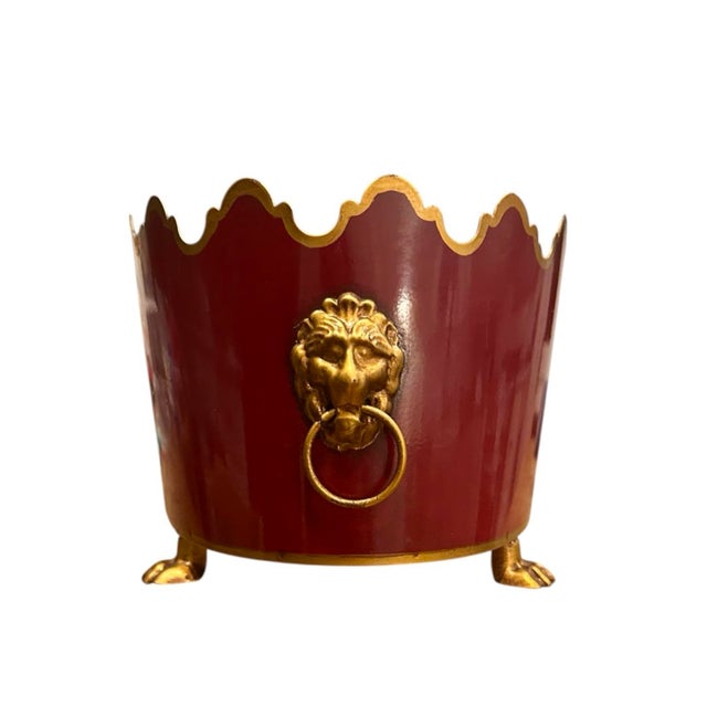 A charming, vintage Italian cache pot. Features a tapered, oblong body in a gorgeous shade of cranberry/burgundy red...