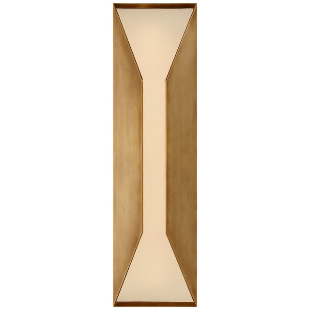 Stretto Medium Sconce in Antique-Burnished Brass with Frosted Glass Designer: Kelly Wearstler Height: 16" Extension: 4.25"...