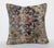 This striking pillow cover is crafted from a vintage hand-knotted tribal rug, bringing authentic Old World character into...