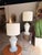Elevate your space with this contemporary transitional table lamp featuring a sculpted white marble base with subtle...