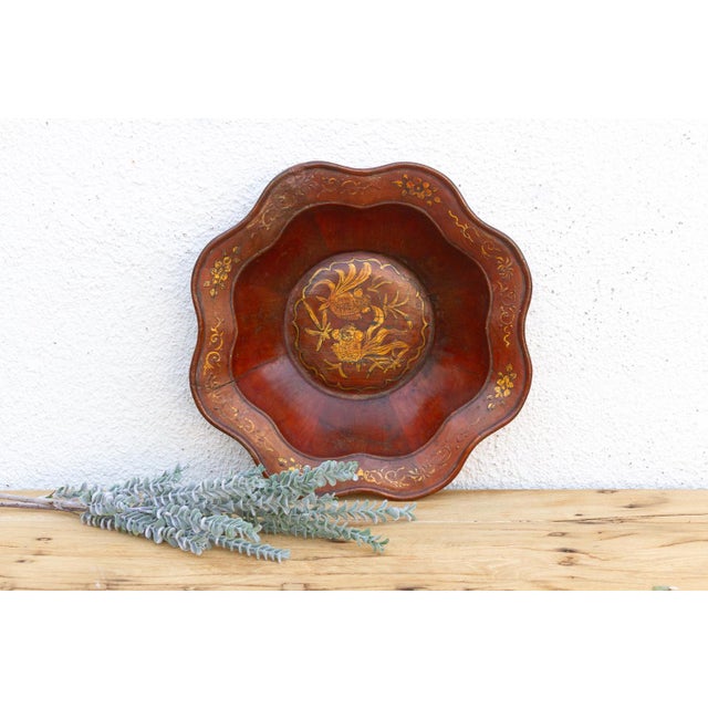 This 14-inch wooden bowl is a striking example of traditional Chinese lacquerware, likely dating from the early 20th...