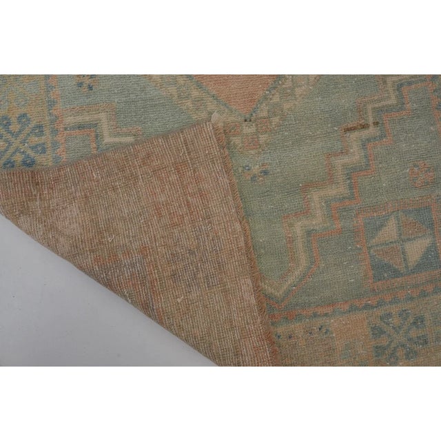 Handwoven Vintage Oushak With Faded Floral Medallion For Sale - Image 9 of 10