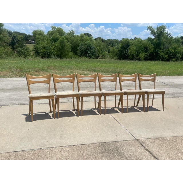 The “Cat’s Eye” Dining Side Chair conveys a certain playful elegance that perfectly embodies the mid-century modern...