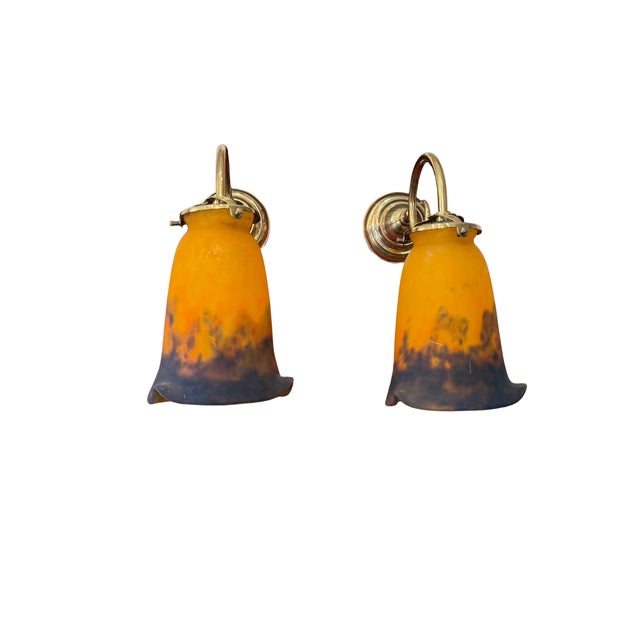 Signed pair of French Art Deco wall sconces by Muller Frères Lunéville, France, circa 1920s. Featuring original acid-...