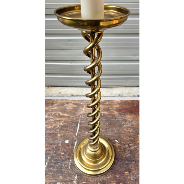 Featured is a nicely aged pair of Vintage Warren Kessler Brass Barley Twist Candlestick Table Lamps. Lamp features a...