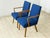 Two stylish vintage armchairs from the 1960s. These armchairs impress with their clean lines, straight armrests, and...