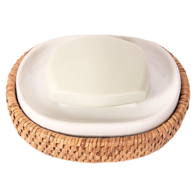 Presenting our Rattan Soap Dish with Ceramic Insert, an elegant way to display your favorite soaps with a coastal flair....