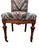 Charming, late 19th-century Victorian era side chairs crafted in warm walnut and (more recent) upholstered in a multi-...