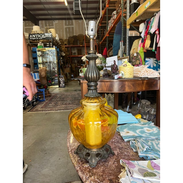 Up for consideration is a beautiful vintage yellow bulbous glass MCM table lamp. This would look lovely in your home and...