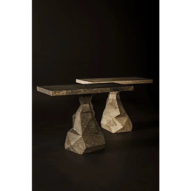 Transform your space with the elegance of the Tilden Console. Its sleek black marble surface exudes sophistication, while...