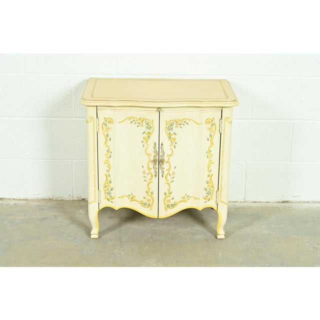 A gorgeous French Provincial Louis XV style commode or nightstand By Drexel Heritage USA, 1970s Cream lacquered walnut,...