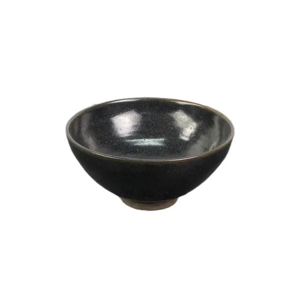 This black ceramic bowl exudes elegance and simplicity. Handcrafted. The bowl's minimalistic design is a nod to the Asian...