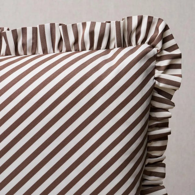 This pillow features Brigitte Stripe with a 1.5" ruffle finish. The perfect thin stripe, not too casual and not too...