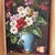 This is a beautiful framed oil painting of a gorgeous arrangement of flowers in an elegant vase. It would be perfect for...