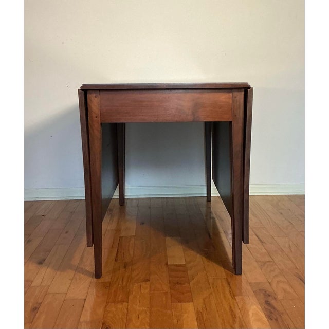 Solid board drop leaf dining table, 1920’s to 1940’s, SOLID WALNUT (NOT VENEER). This solid wood drop-leaf dining table...