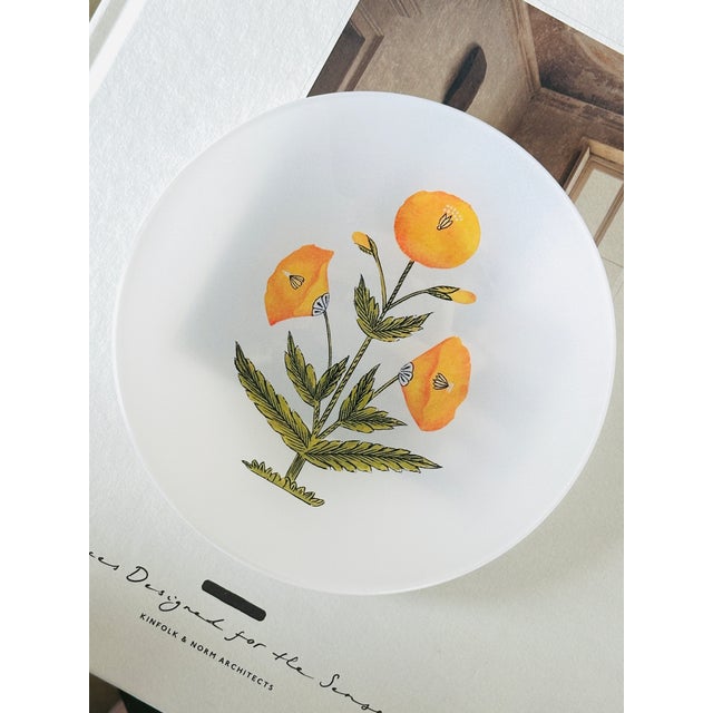 This glass trinket dish features exclusive artwork created just for Two Pink Parrots, bringing our signature whimsy into a...