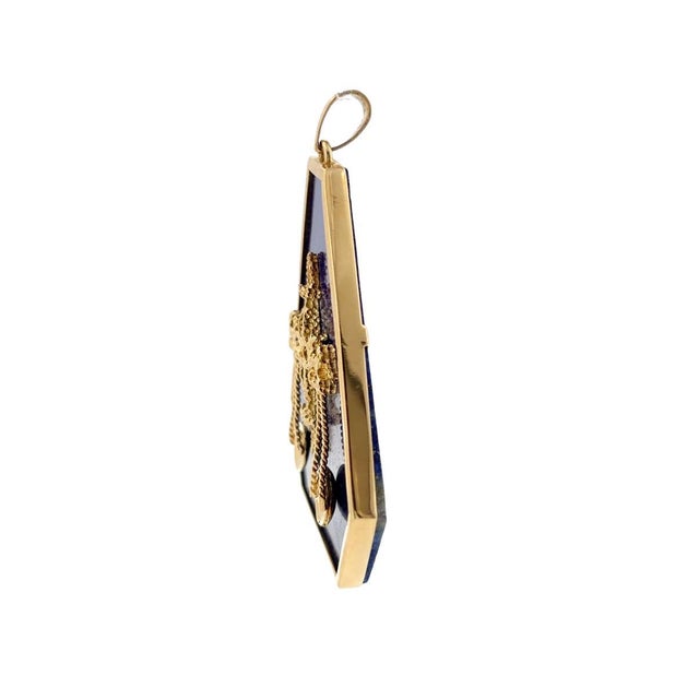 Vintage Italian large Libra zodiac pendant, featuring a centered gold scales motif set on a lapis lazuli slab in 18K...