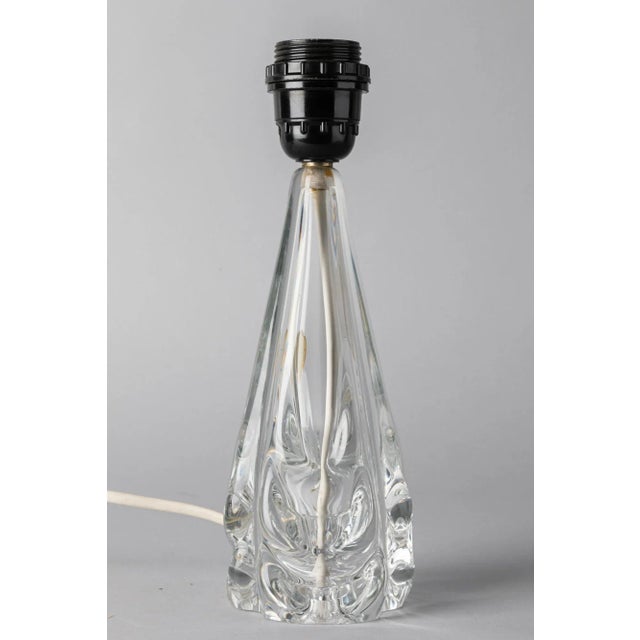 This bedside or table lamp with a crystal base was manufactured in France during the 1940s. The lamp is in very good...