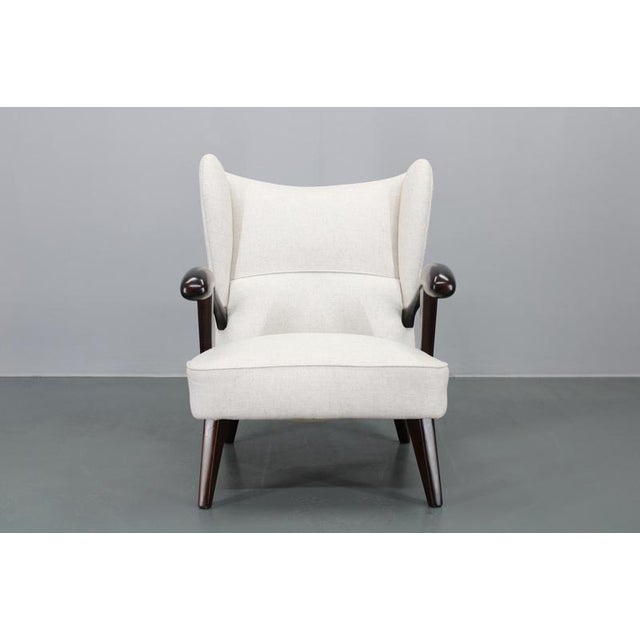 Carefully refurbished - Newly upholstered in natural fiber based fabric - Stained solid beech wood - sturdy and stable.