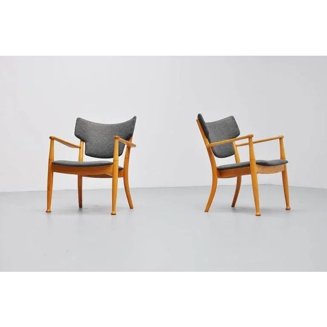 Fantastic pair of easy chairs designed by Peter Hvidt (Designer) and Orla Molgaar Nielsen (Architect and Designer) for...