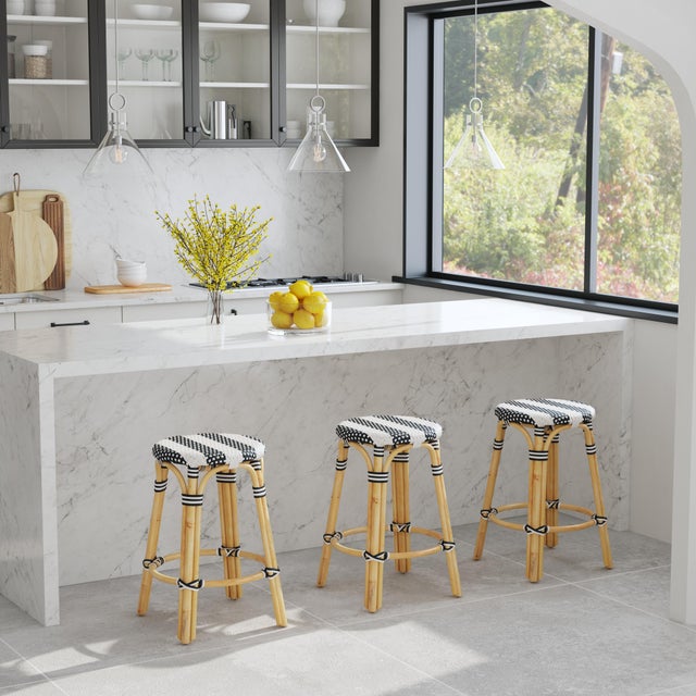 Evoking images of sidewalk tables in the Cote d'Azur, counter stools like this will give your kitchen or patio the casual...