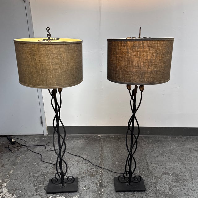 Design Plus Gallery presents a Pair of Sabina Wrought Iron Figural Floor Lamps from Pottery Barn. Each lamp is formed in...