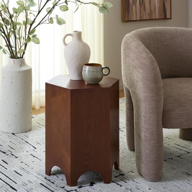 Introducing the Barahan End Table, a stunning presentation of sophisticated Walnut wood. This finely crafted piece is sure...