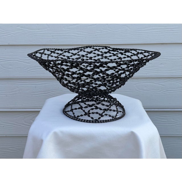 Excellent craftsmanship is displayed in this Arts & Crafts decorative bowl. The gunmetal gray metal is not only hand...