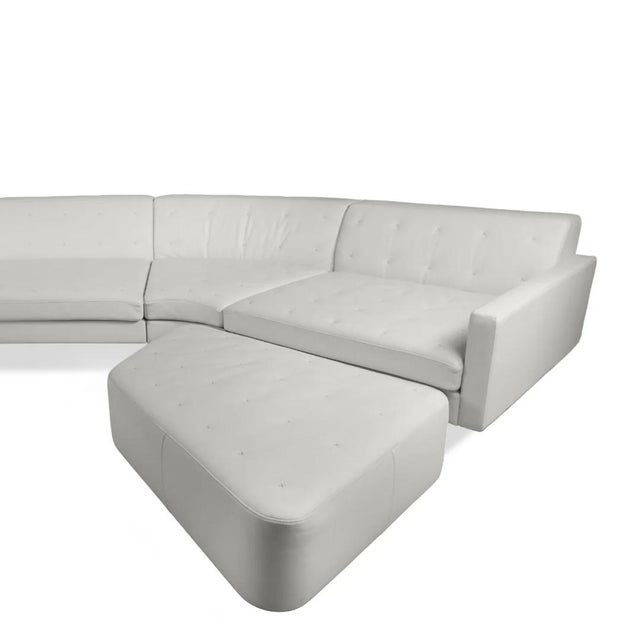The Poltrona Frau Kennedee Sectional Sofa with Ottoman by Jean-Marie Massaud exemplifies Italian design excellence and...