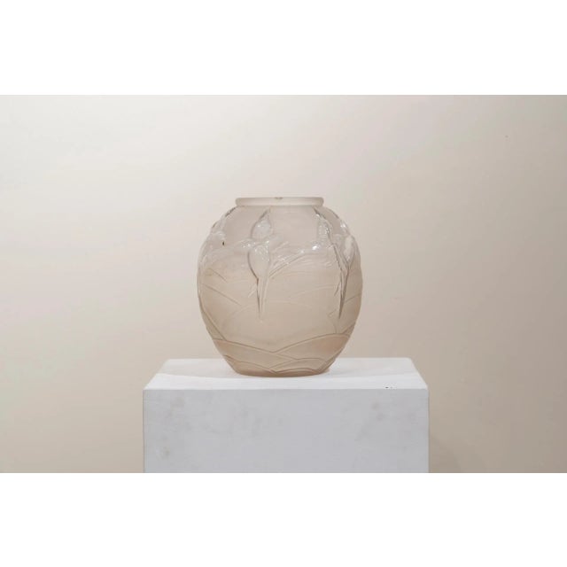 White glass ball vase with swallows, signed Etling, incised on the base. Edmond Laurente Etling, a French art dealer, had...