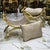 Stunning lovely bench/settee. This is tufted in high end designer light brown damask fabric. The frame has gold leaf...