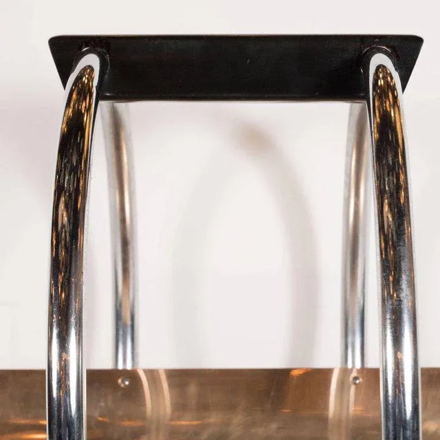 This iconic American streamlined Machine Age Art Deco design- often misattributed to Norman Bel Geddes- was designed by...