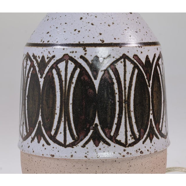 Stylish earthenware lamp base by Marianne Starck for Micheal Andersen Bornholm, 1960s. The lamp is glazed in beautiful,...