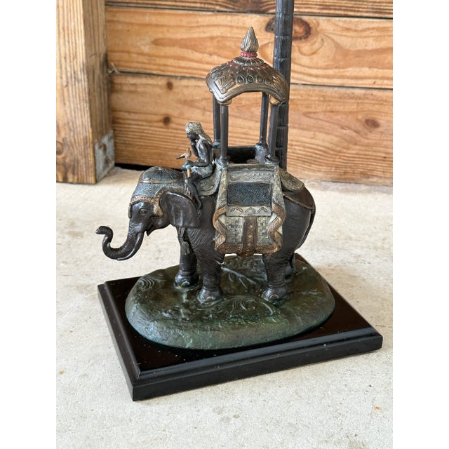 Cold painted Bronze metal elephamt with a Howdah under a tole palm tree from Austria styled after Franz Bergman. Beautiful...