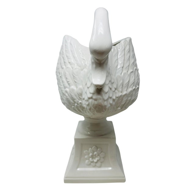 An impressive and highly detailed vintage "Blanc de Chine" (white-glazed) ceramic urn centerpiece, handcrafted in Italy....