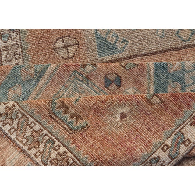 Tribal Medallion Design Antique Persian Kurdish Rug in Warm Earth Tones For Sale - Image 12 of 13