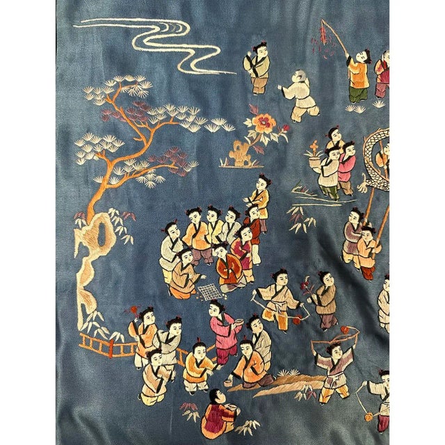 This silk embroidery of Baizi (Hundreds of Children) playing in Spring is hand stitched on the silk fabric. The allusion...