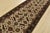 An authentic Agra runner hand-knotted with fine wool on a cotton foundation. This rug features a botanical design set...