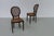 French Louis XVI Style Cane Side Chairs, 1880s. Set of 2. Gorgeous pair of hand carved side chairs with original woven...