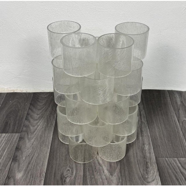 Stunning and rare wall lamp (wall sconce) model A 703, an iconic piece of Italian design designed by Albano Poli for the...